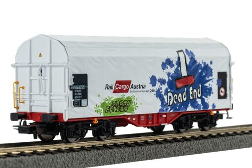 Schiebeplanenwagen Rail Cargo Austria VI mit Graffiti