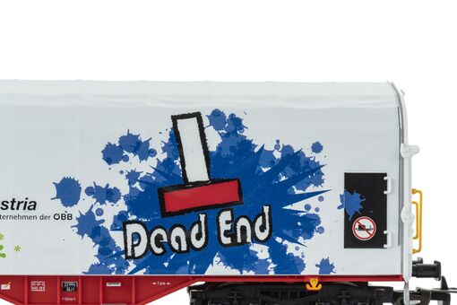 Schiebeplanenwagen Rail Cargo Austria VI mit Graffiti